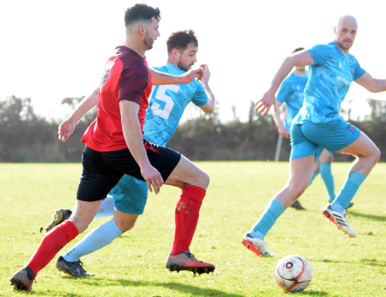 Clarby Road Senior Cup two-goal  hero Ben John on the attack against Tenby